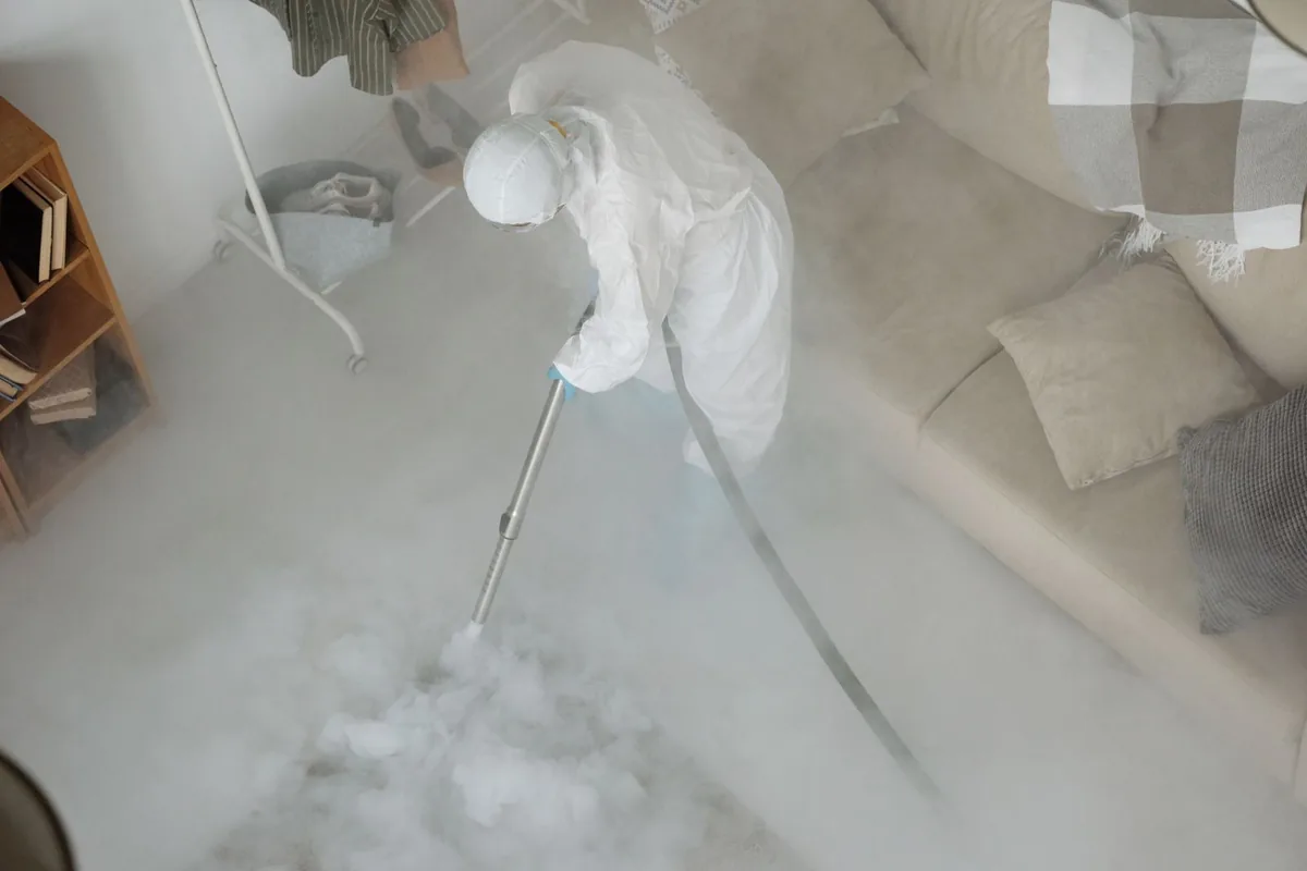 Biohazard cleanup technician in protective equipment, Kathleen, FL